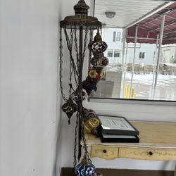 Beautiful lamps for sale, 250 for both. They were used for two months in the entrance of a restaurant; the new owner doesn't need them.