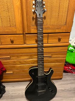 Dean and Gibson electric guitar
