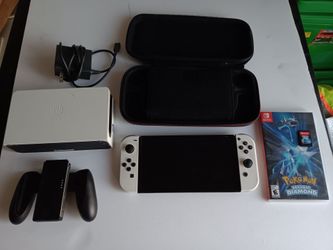Nintendo Switch OLED white bundle with case and Pokemon game