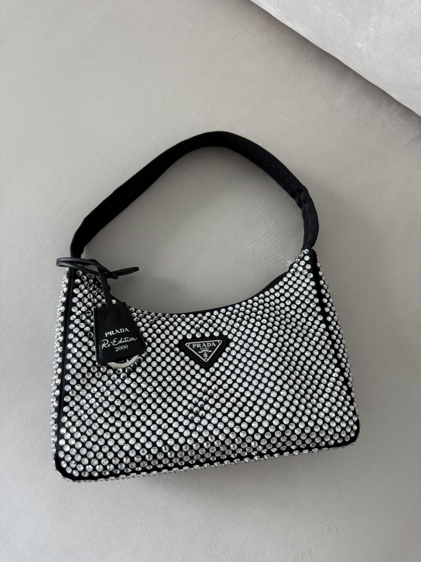 Prada Re-Edition Satin mini-bag with crystals 