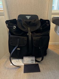 Prada bag with authenticity cards