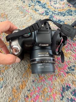 Canon sx20 is camera with accessories and cleaning kit