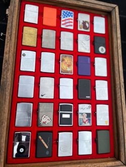50 zyppo lighters in the case