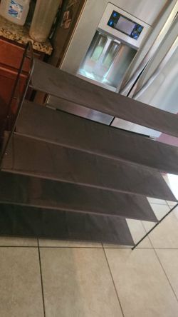 5 tier shoe rack / storage shelf clean no damages asking $40 cash must pick up Broadway and apache b