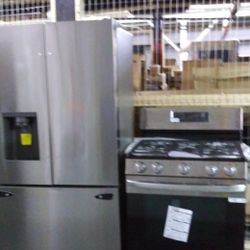 New LG French Refrigerator With New LG Five Burner Range