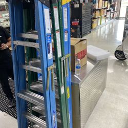 Three Werner 6 Foot Fiberglass Ladders 