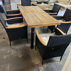 7-Piece Wicker Outdoor Dining Set with Beige Cushions and Acacia Wood Tabletop and Armrest $499