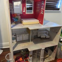 Wooden doll house with doll house furniture