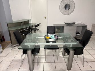 Dining set 52’x36’ and is expandable  with bar