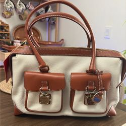 Like new / never used Dooney & Bourke Pebble Grain Double Pocket Satchel in a beautiful cream and tan color combo.