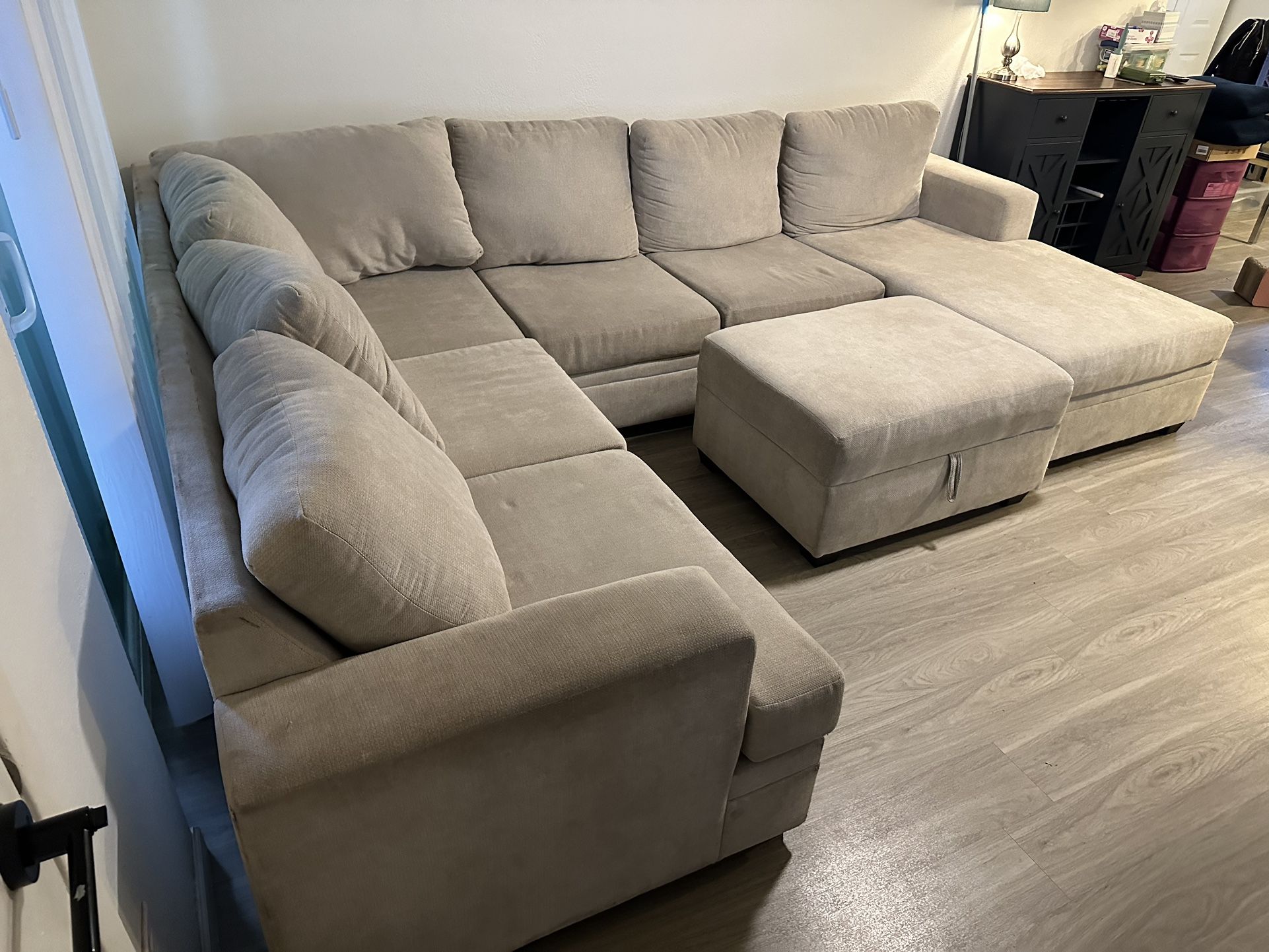 Sectional couch with ottoman