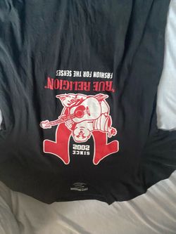 small red and black true religon shirt