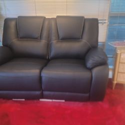Brand New Love Seat With 2 Recliner.