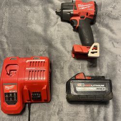 Milwaukee 1/2in Impact, Battery, And Rapid Charger.