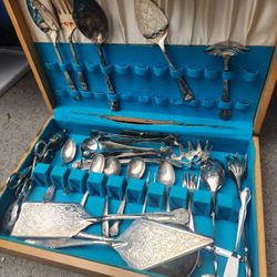 silver plated and silver mislcl utensils