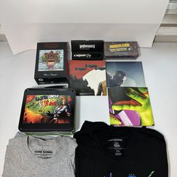 Lootcrate open box, tshirts, lunch box Jimmy, stranger things toy, posters
