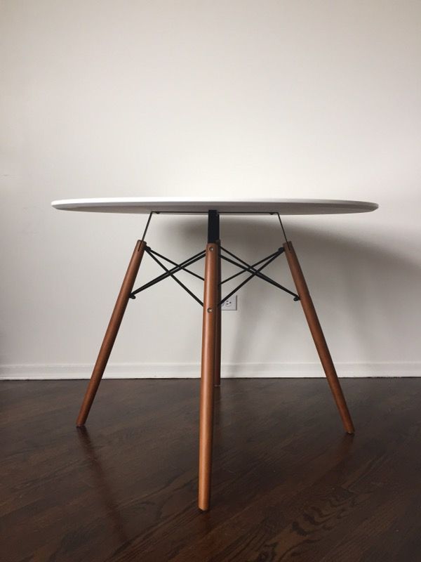 Fuego round dining table by Langley Street