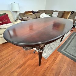 Extendable Solid Wood Dining Table with Gold Accents 