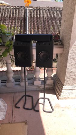 Bose bookshelf and center speakers sets.