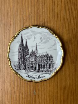 Vintage Cologne Cathedral (Kölner Dom) 22k gold plating on a scalloped border.