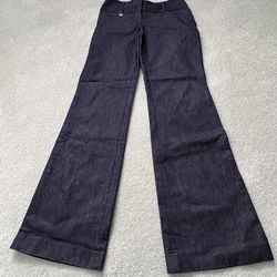 Women’s express editor low rise size 0 boot, cut black jeans