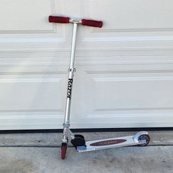 Like New Razor Scooter ( Adjustable Height). Price Firm!