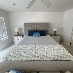 BEDROOM SET — Ashley Realyn California King Sleigh Bed – Tufted French County and pair of matching nightstands