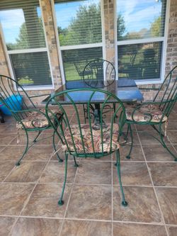 Marble top table w/wrought iron base & 4 chairs