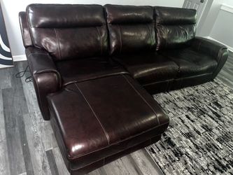 Three seater reclining leather couch