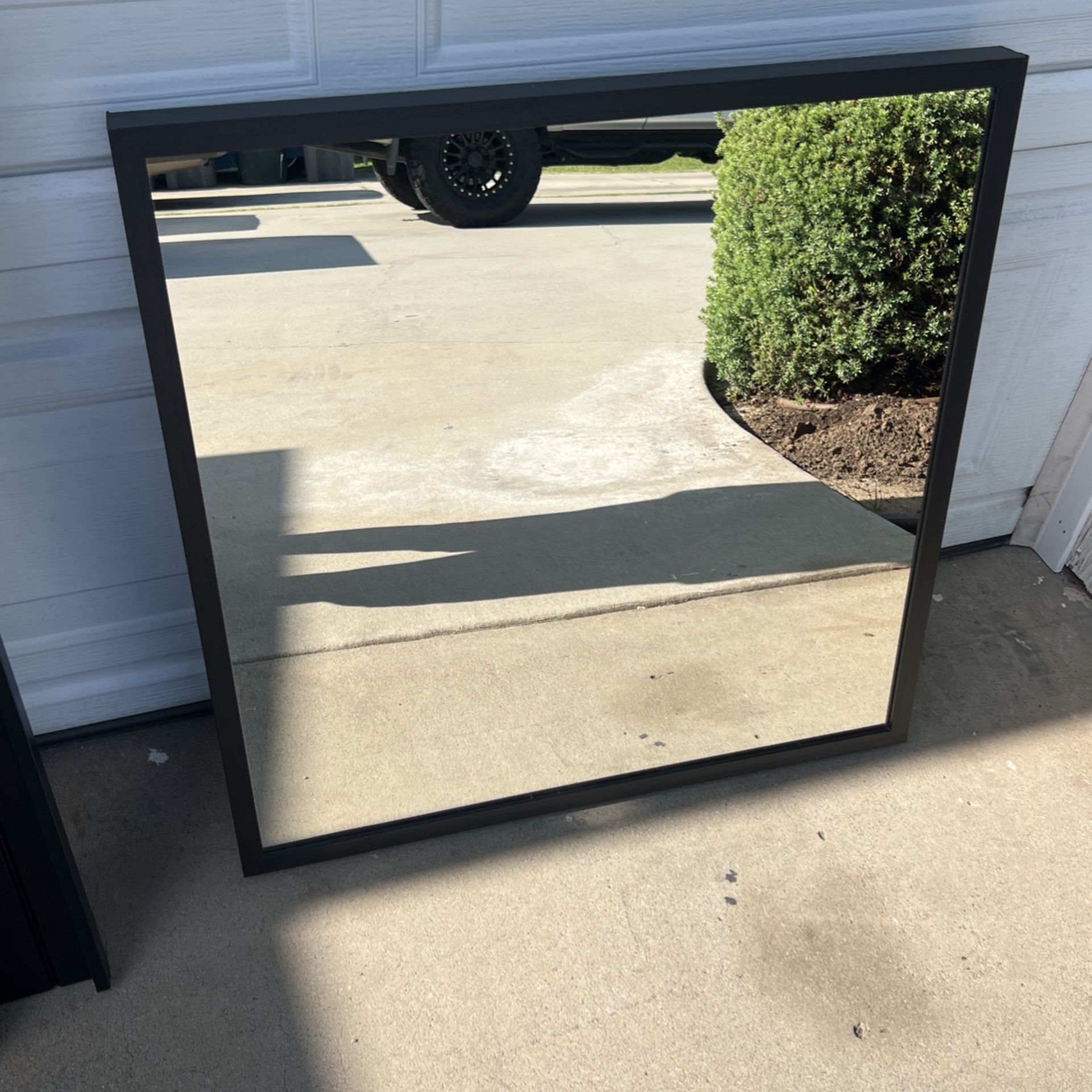 Mirror And Book Shelves 