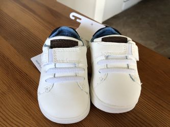 Brand new Carter’s shoes, size 2.5