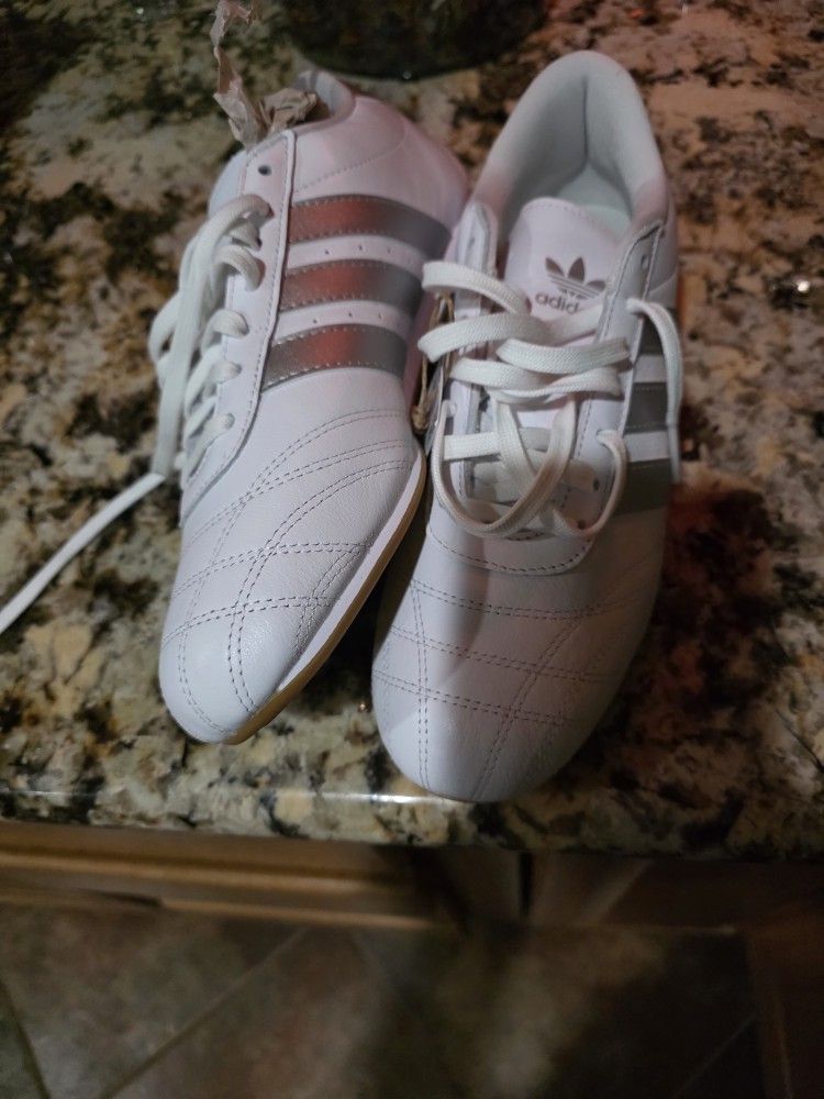 Authenticity Guarantee
Adidas Taekwondo Athletic Lace Up Womens Sneakers In White Silver