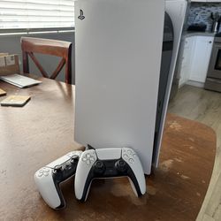 PlayStation 5 (Disc) with 2 controllers