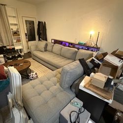 Grey L-Shaped Couch w/ 2 Pillows