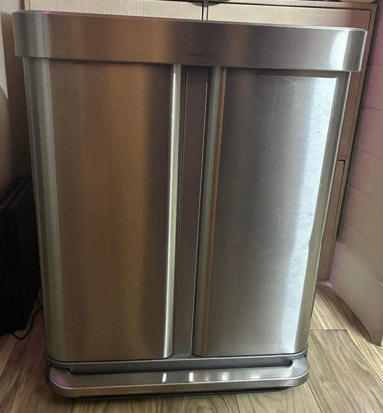 Stainless steel simplehuman wastebasket
