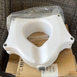 Raised Toliet Seat Brand New