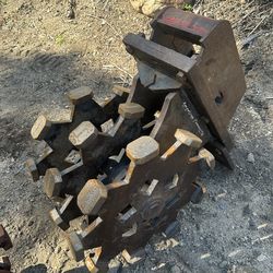 Backhoe excavator compaction wheels