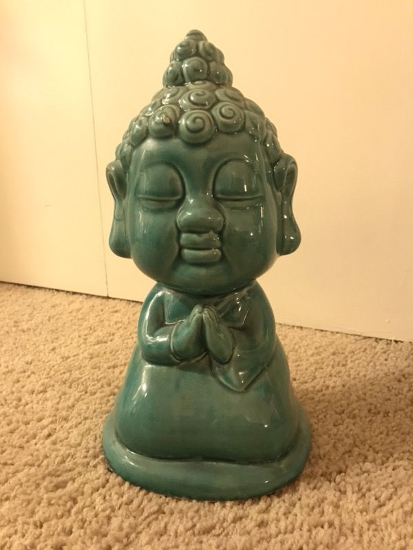 Tranquil ceramic Buddha accent piece/ decorative item