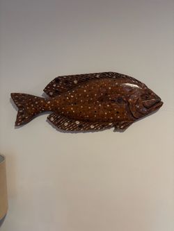 Wooden halibut carving