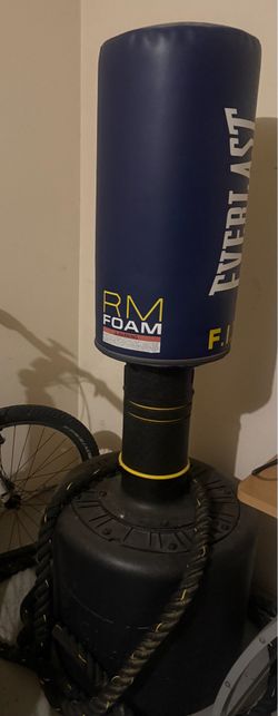Boxing heavy bag with battle ropes