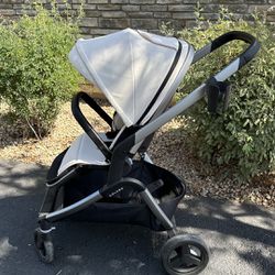 $300  - COLUGO Complete Stroller with car seat attachment for Nuna