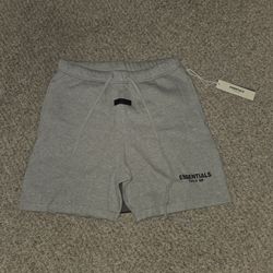 Grey essentials shorts size Meduim
