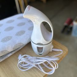 Conair Complete Steam Hand Held Fabric Steamer and Ironing foldable Board.