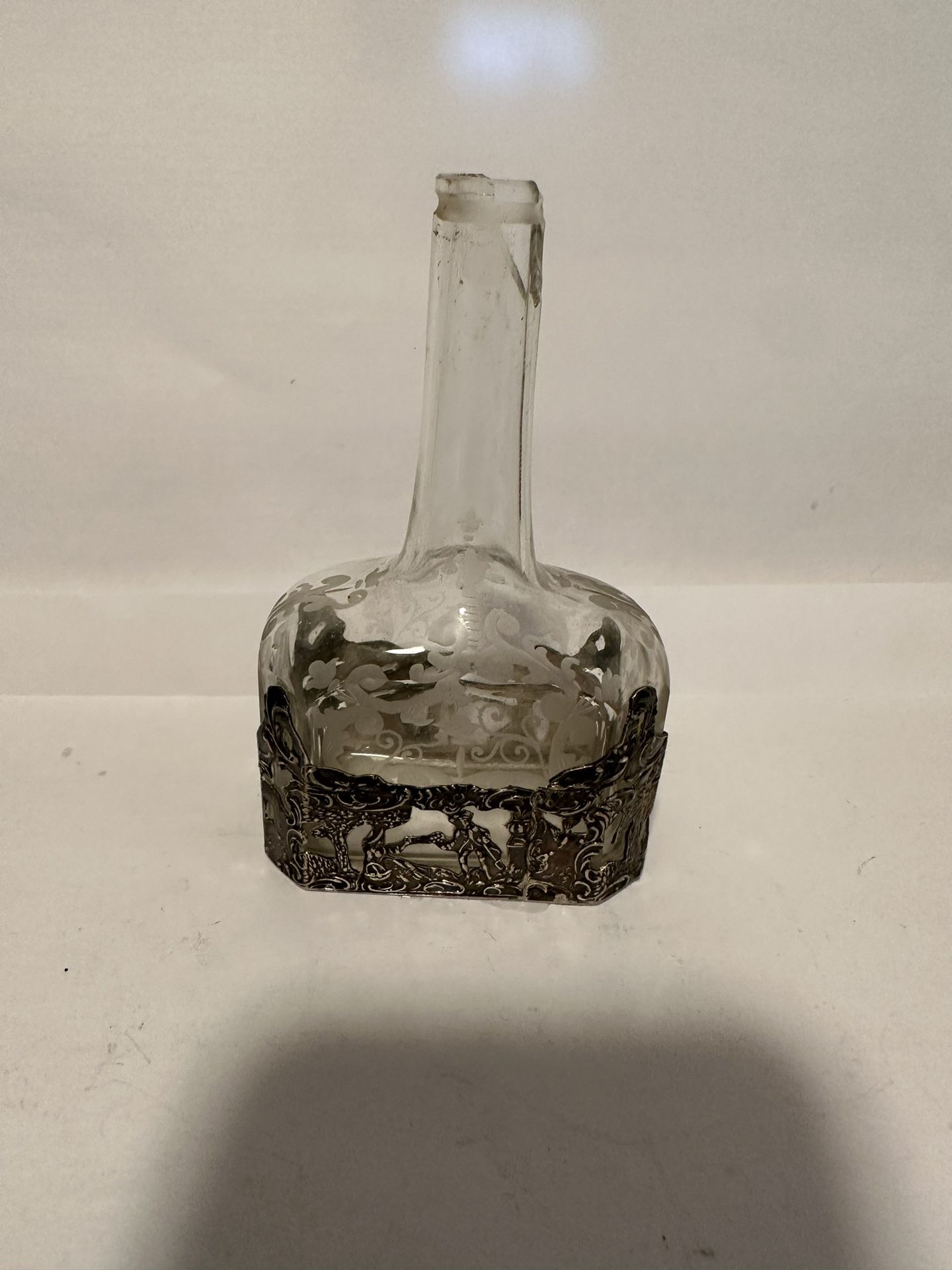 German Silver- mounted Glass Decanters, Hanau, late 19th/early 20th century, Storck & Sinsheimer, maker, colorless glass bottle