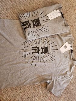 Two Klay Thompson "Shock the Game" t-shirts