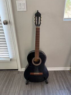 Guitar with stand