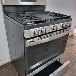 STOVE GE BRAN NEW STAINLESS STEEL GAS