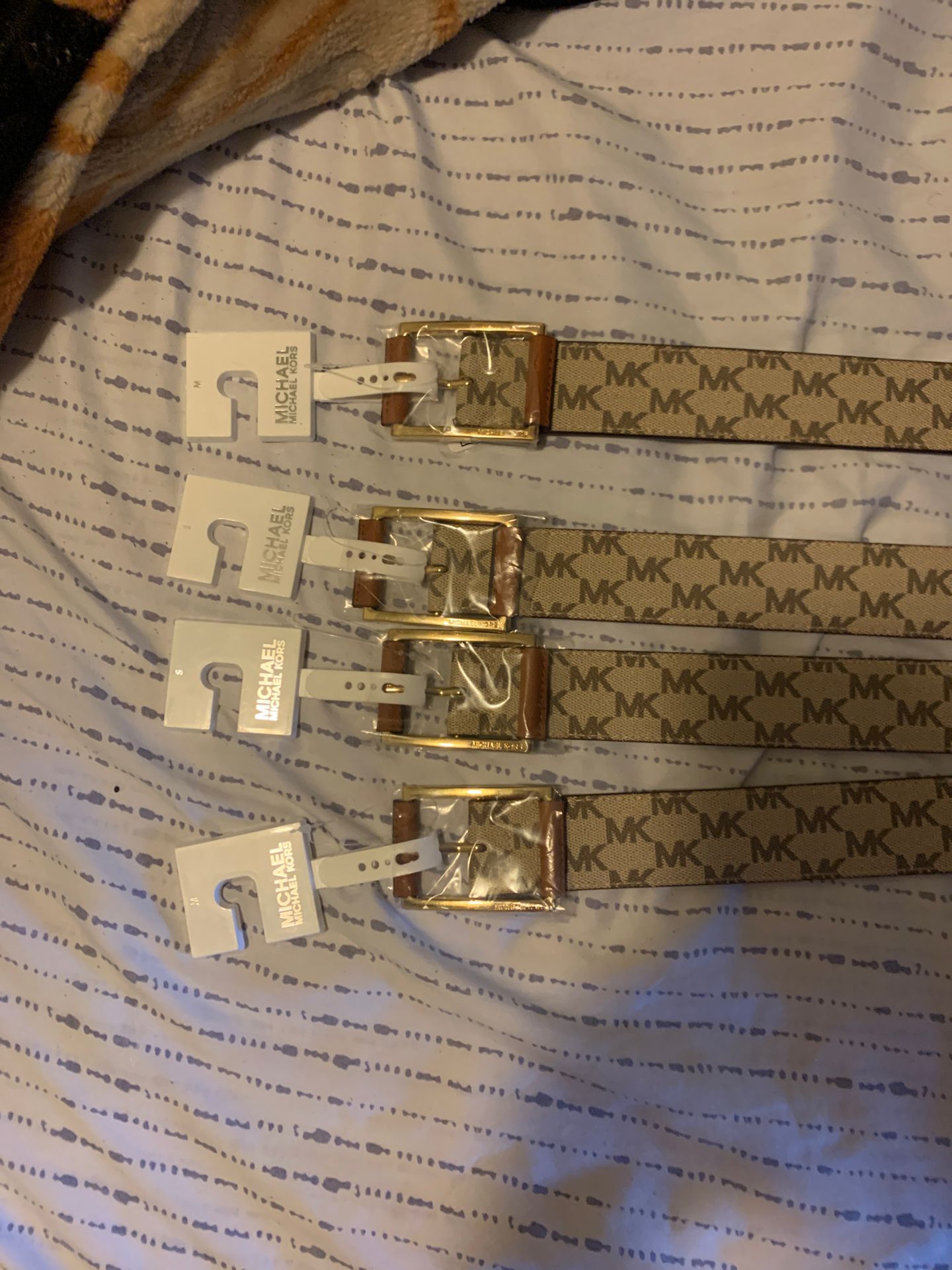 Michael Kors belt size medium and small $15 each