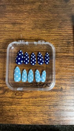 Navy blue nails and baby blue polkadot nails