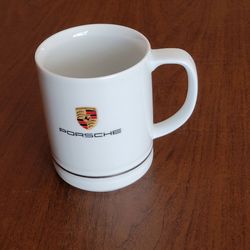Porsche Crest Mug Cup White with Gold Trim Porsche Logo 1120 Made in 
Germany.
It is rare collectible porcelain cup featuring the official Porsche 
cr